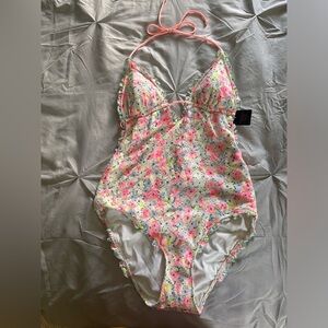 NWT Victoria’s Secret one piece floral bathing suit. Size L
